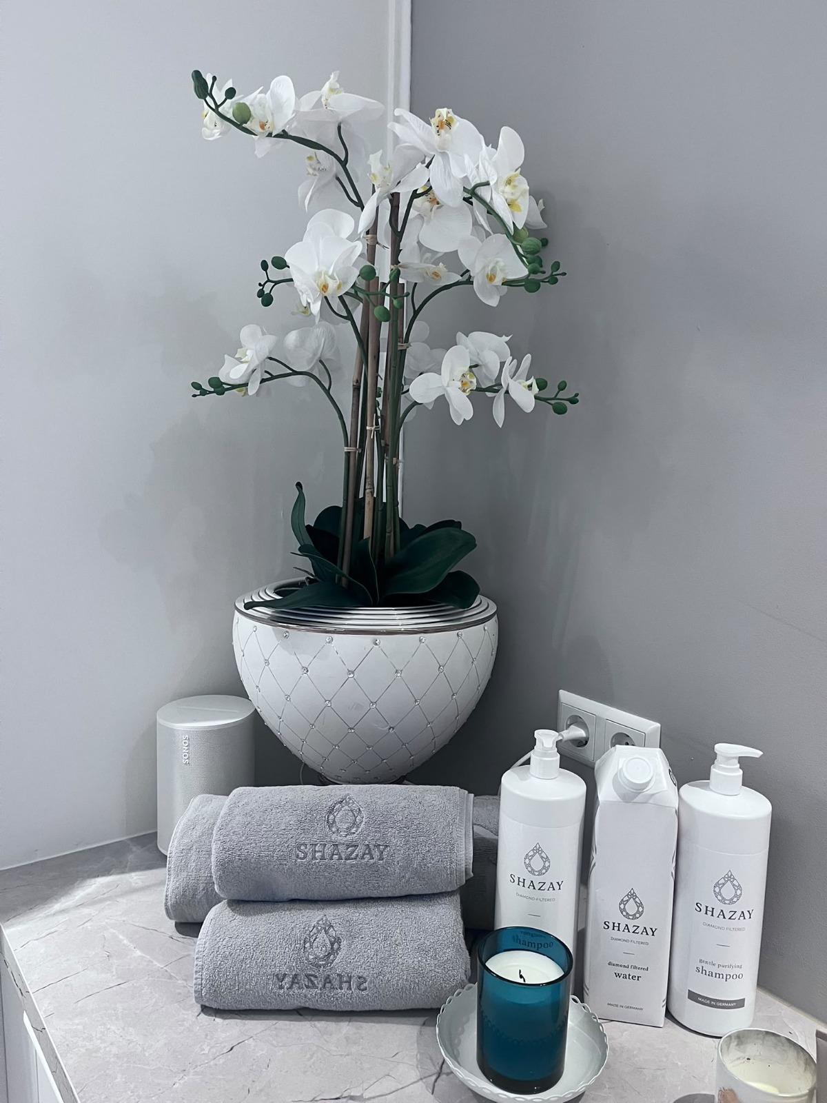 SHAZAY Handtücher, Orchidee und Pflegeprodukte